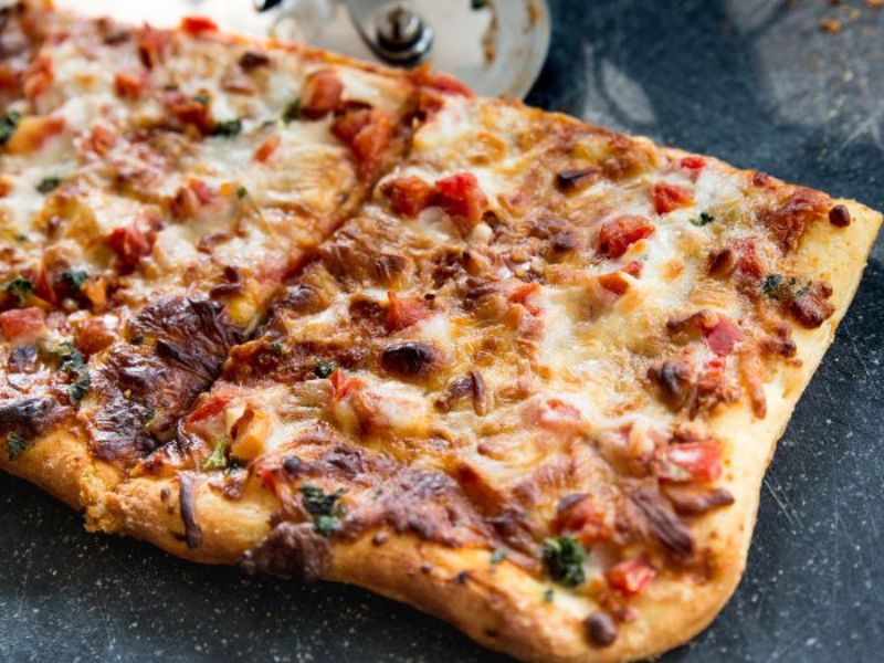 Pizza réalisée par le coin gourmand